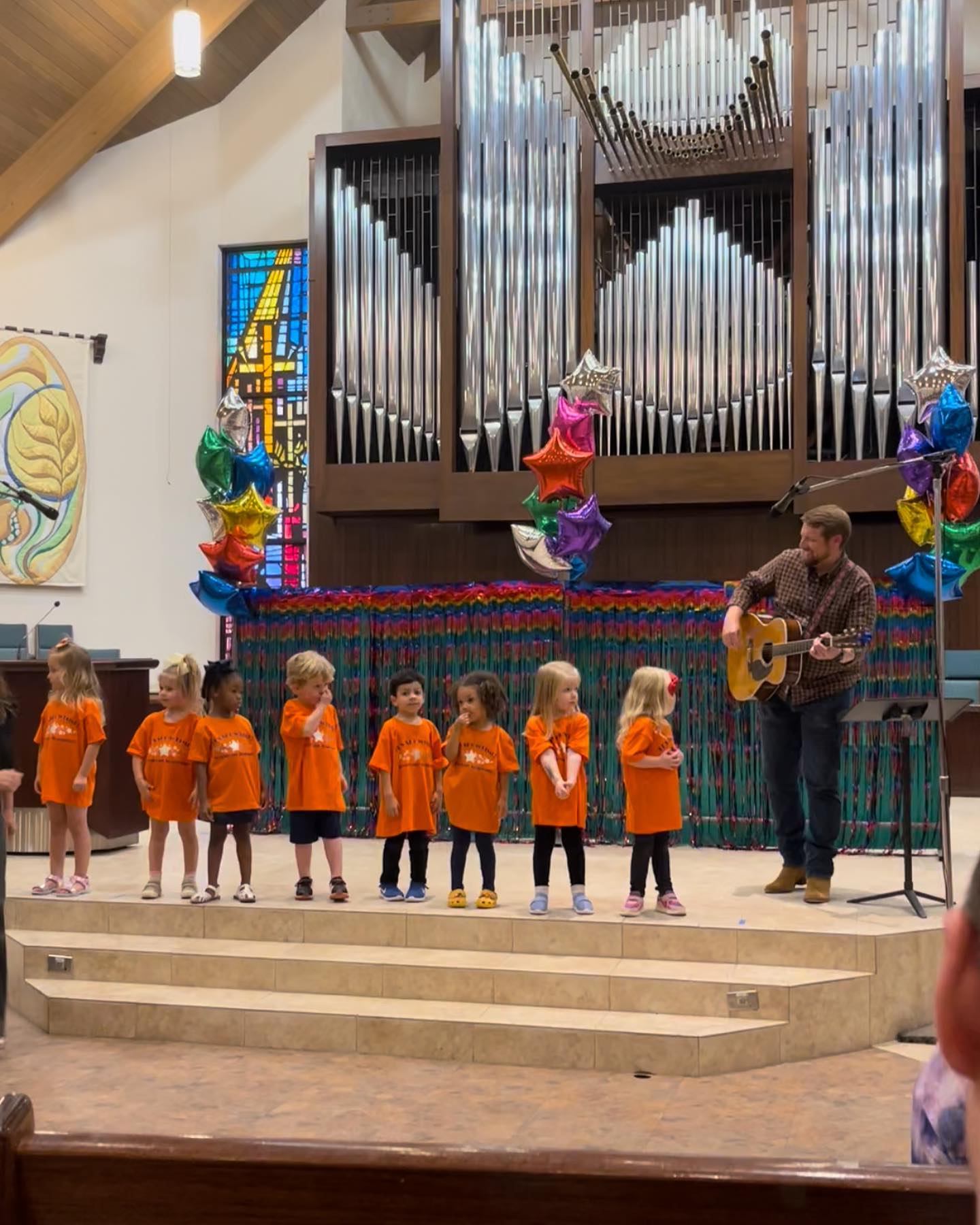 Children enjoying music and movement time